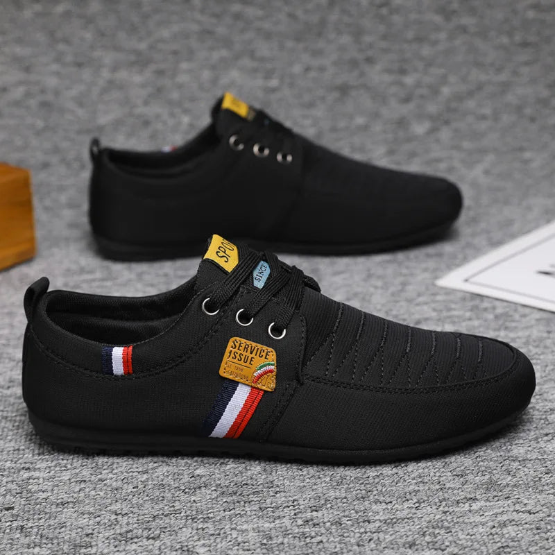 Comfortable driving shoes in gray, designed for long drives with a cool, dry feel.