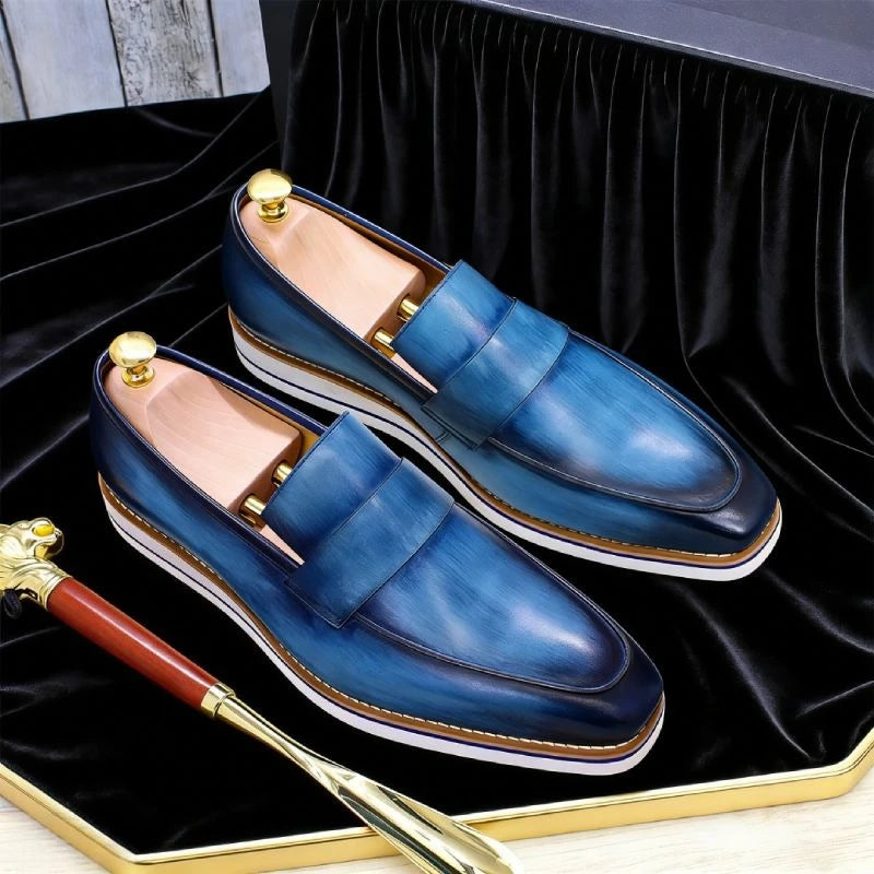 Handmade black leather loafers for men with slip-on design and premium genuine leather construction