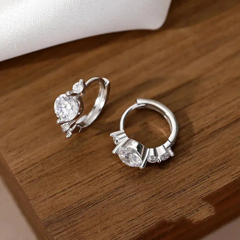 Whisper of Elegance zircon earrings displayed in beautiful packaging, ideal for gifting.