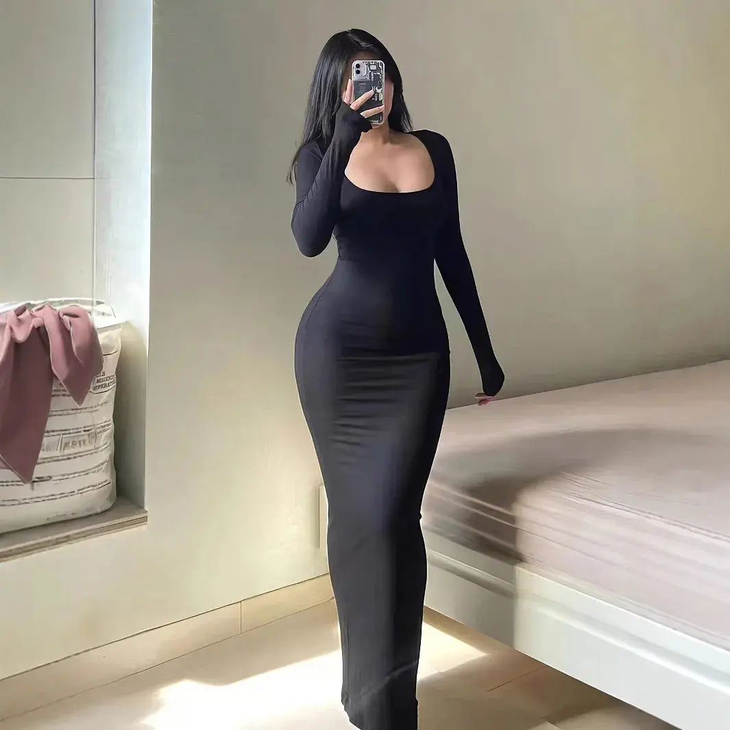 Full-length view of the Midnight Whisper dress in black, ideal for evening wear and formal events.