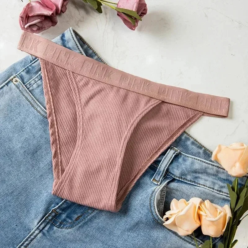 Detail shot of elastic waistband and hip-hugging fit on cotton blend underwear