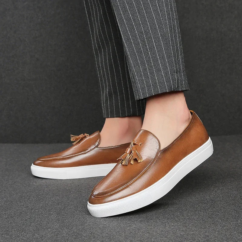 Side view of breathable leather slip-on loafers with rubber sole