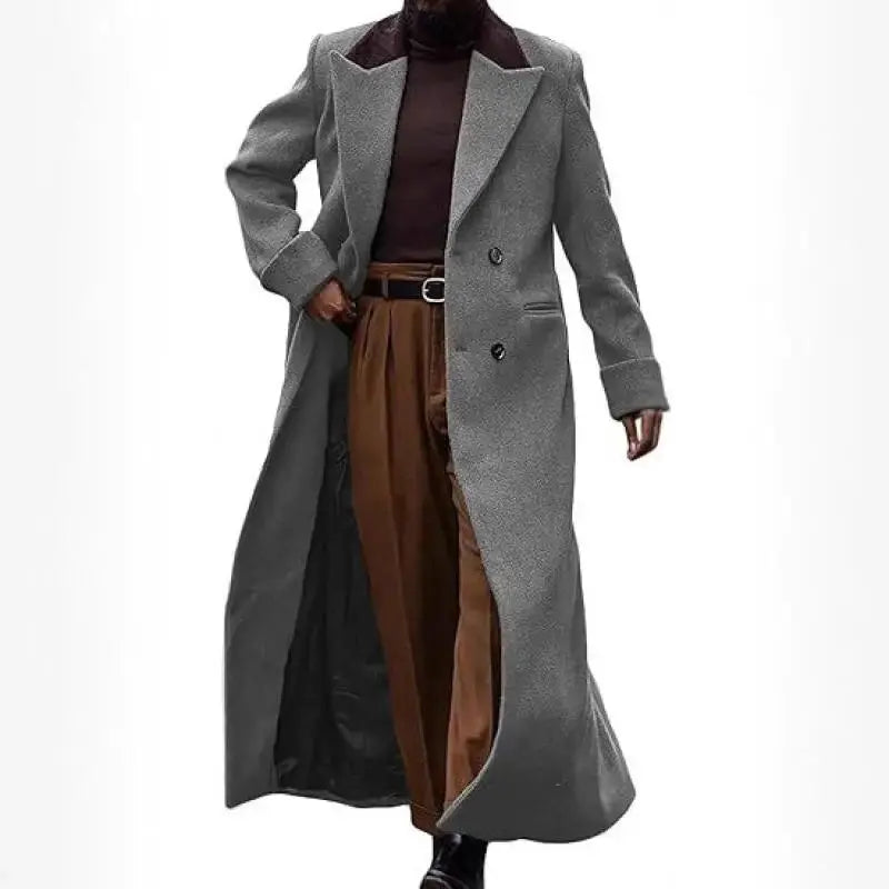 Double-breasted winter coat in rich navy wool, showcasing elegant lapels and tailored silhouette.