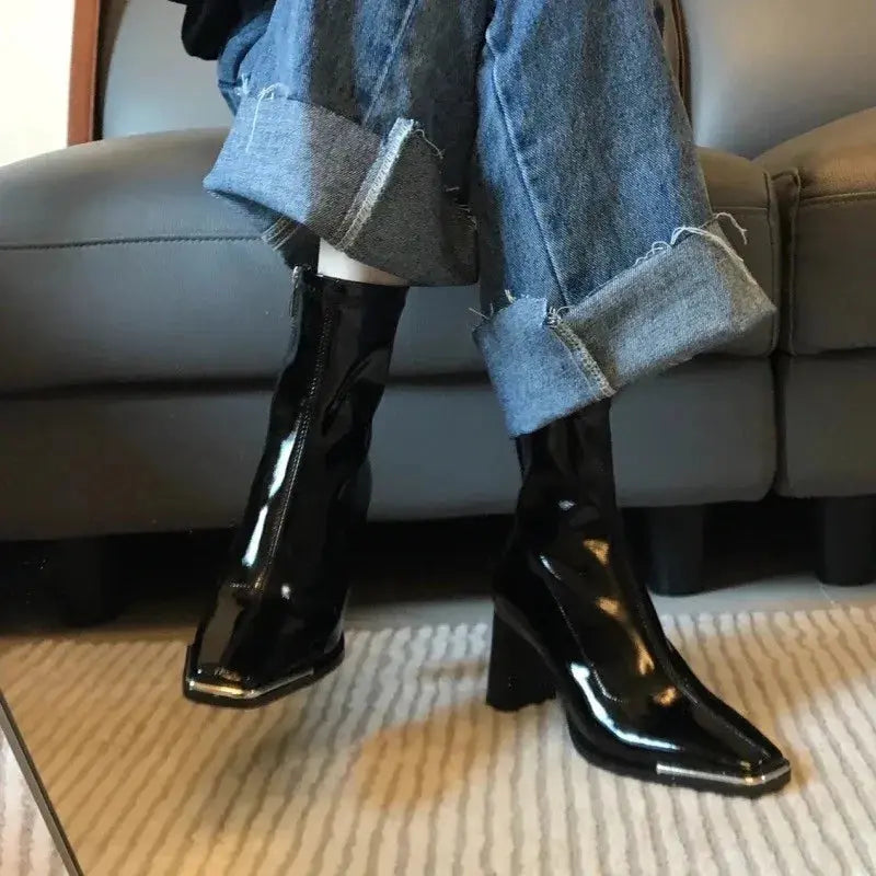 Midnight Whisper Boots styled with autumn outfit, perfect for night outings.