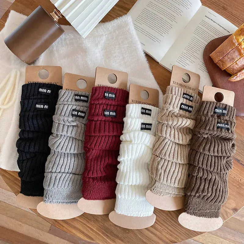 Cozy gray acrylic socks with seamless design for ultimate comfort.