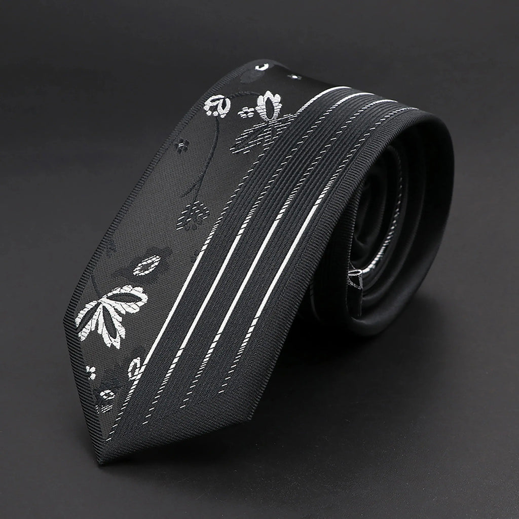 Sophisticated men's tie in deep purple and black, perfect for formal events.