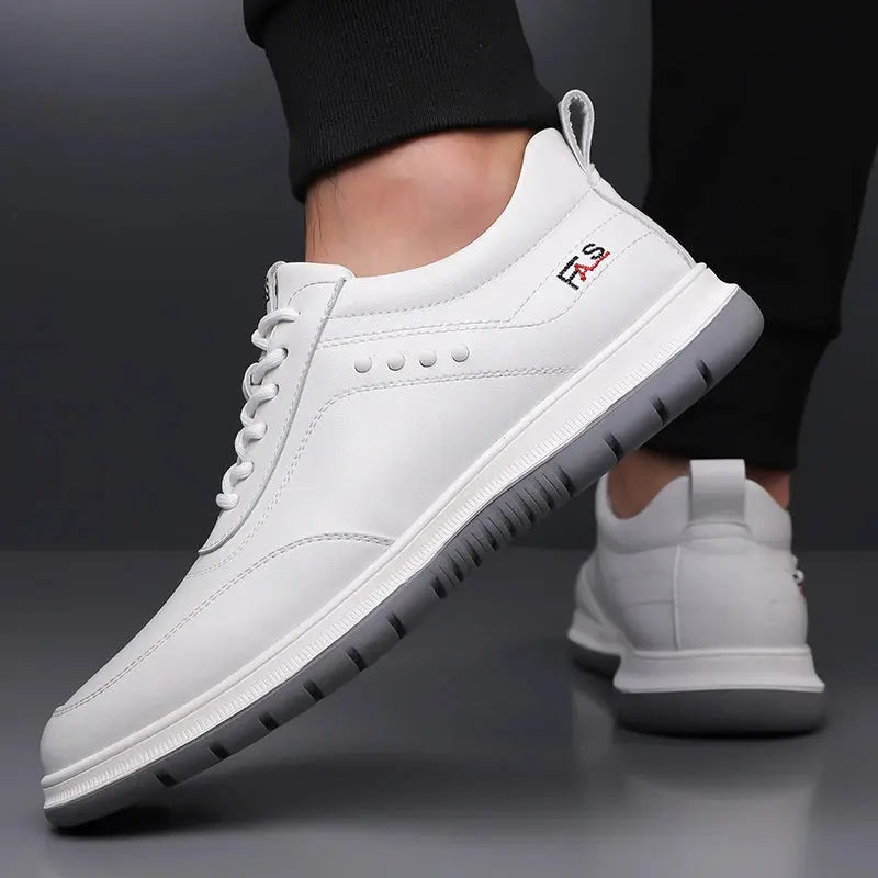 Close-up of split leather Oxford shoe displaying quality stitching and refined craftsmanship