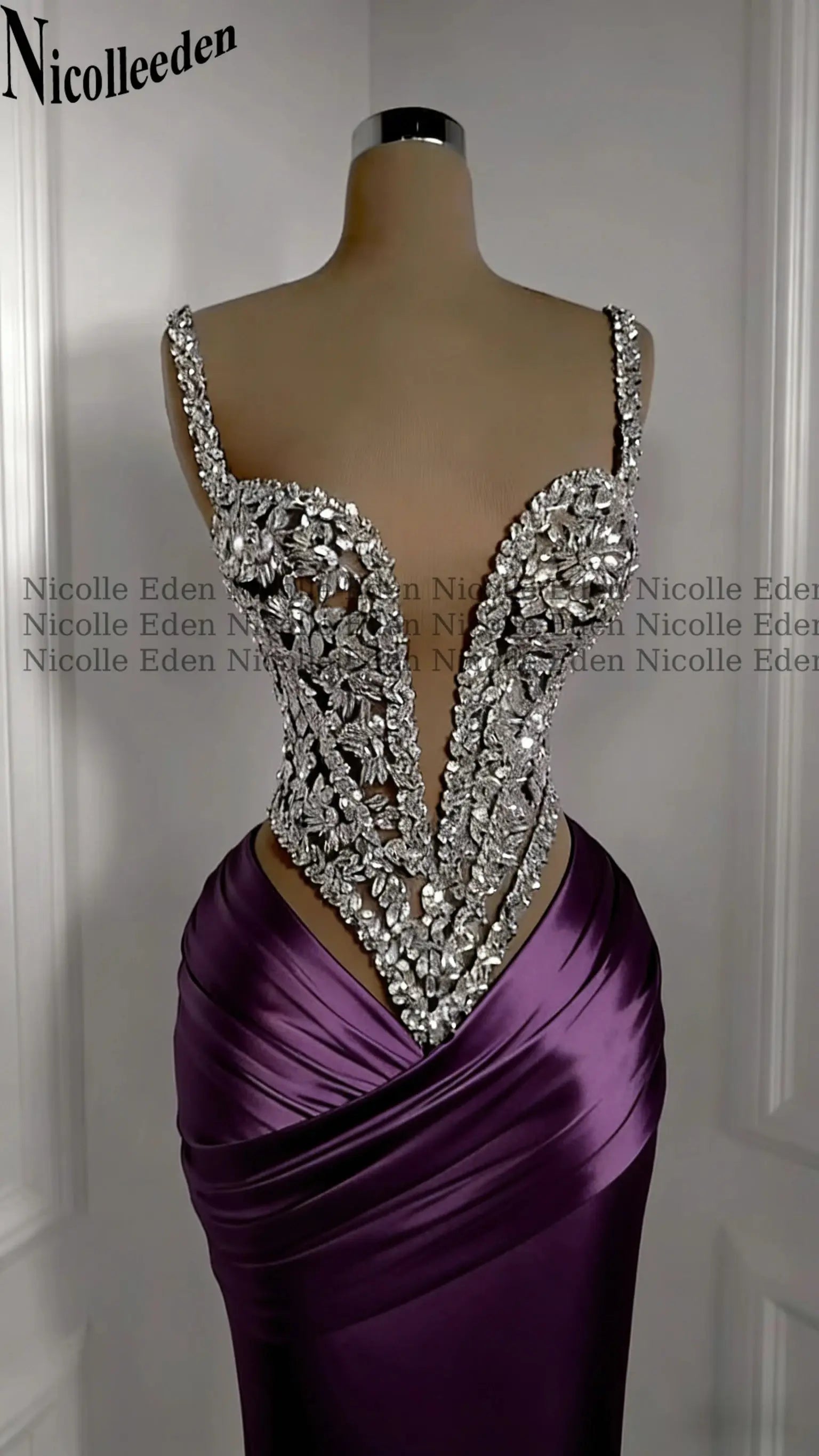 Back view of the Rhinestone Gala Gown showcasing its flowing A-line design and satin fabric.