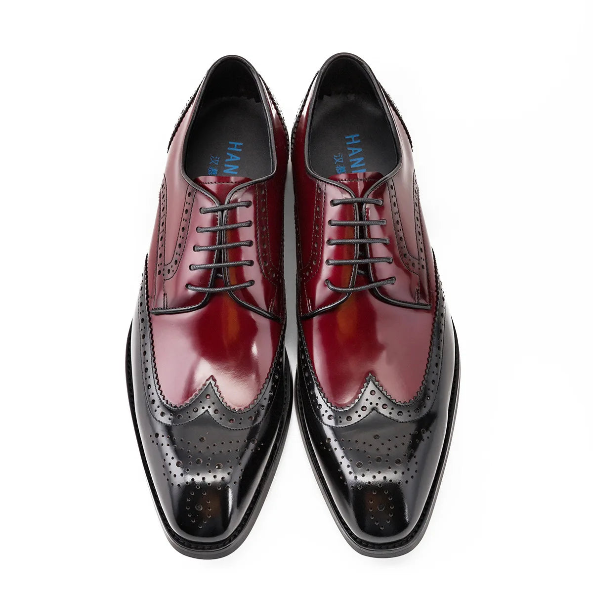 Black genuine leather pointed toe lace-up oxford shoes with sleek professional silhouette on white background