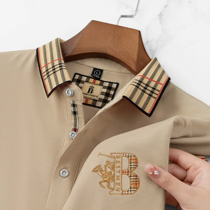 Cotton-polyester polo with anti-pilling fabric, contrast collar, and decorative embroidered design