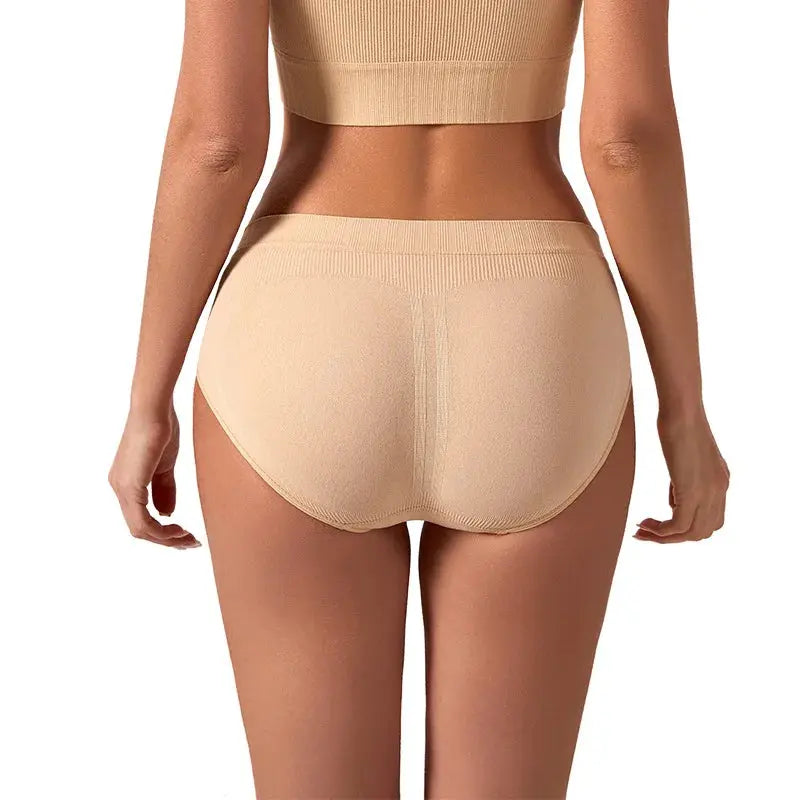 Model wearing stylish leak-free period panties, demonstrating a seamless fit under clothing.