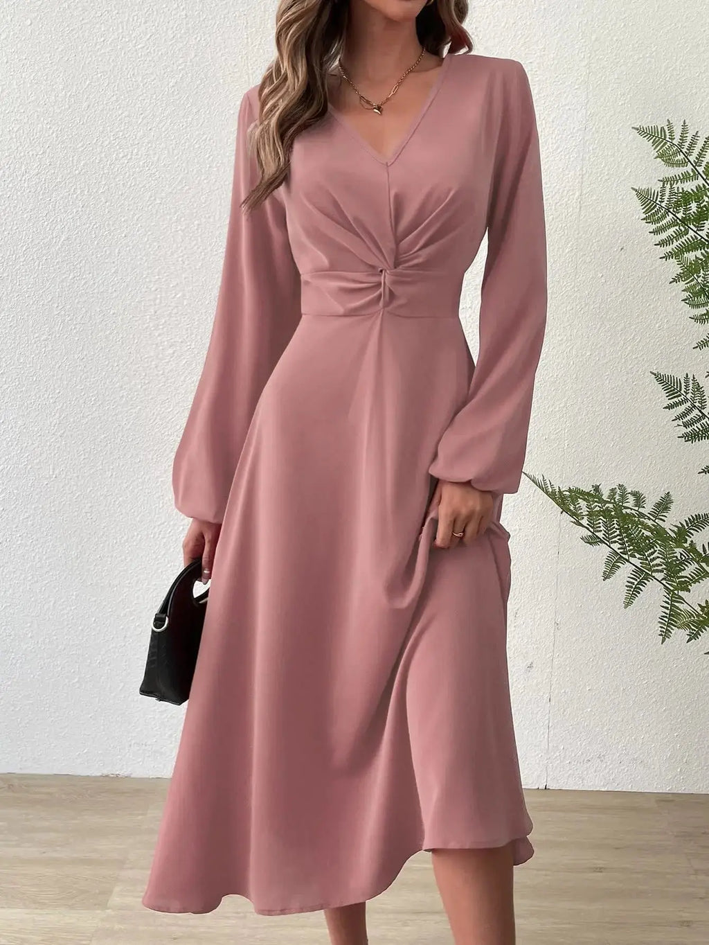 Full view of the Midnight Allure dress highlighting its modern classic style and lantern sleeves.