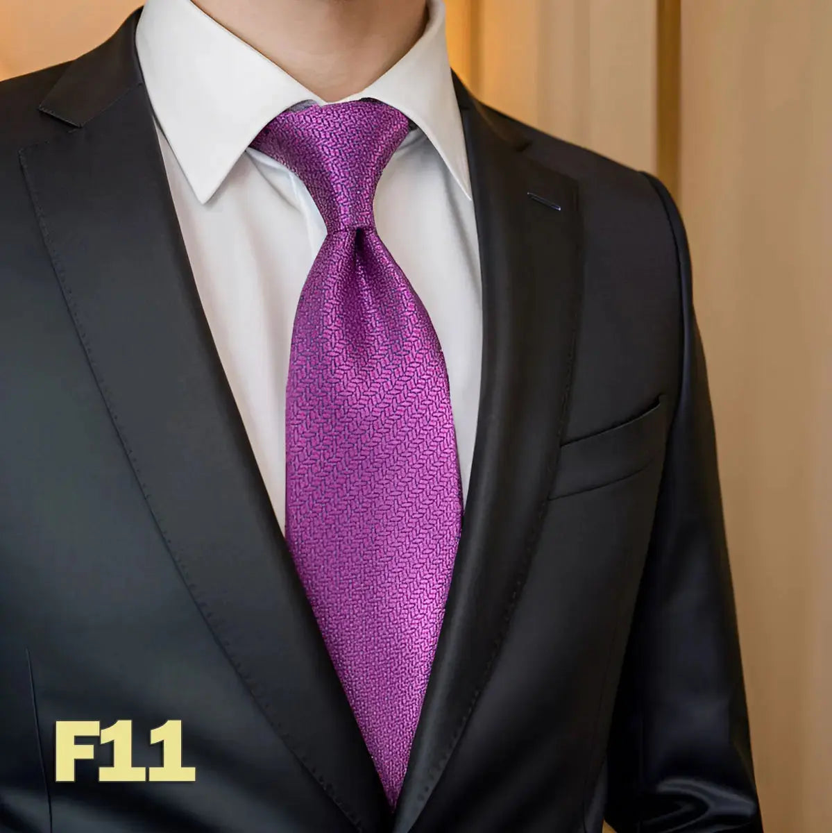 Chic black tie with elegant jacquard patterns, ideal for formal events.