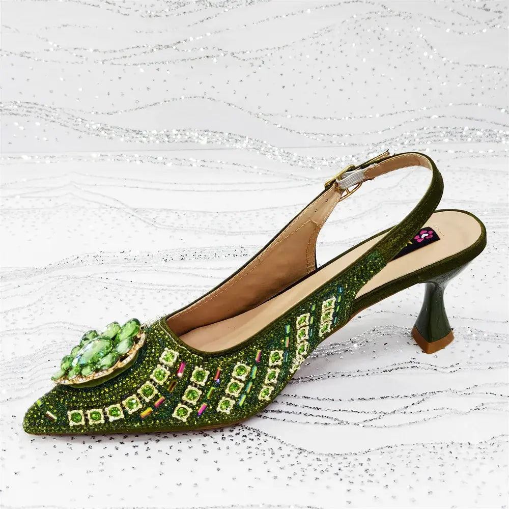 Comfortable buckle strap on the Venus Chan green heels.