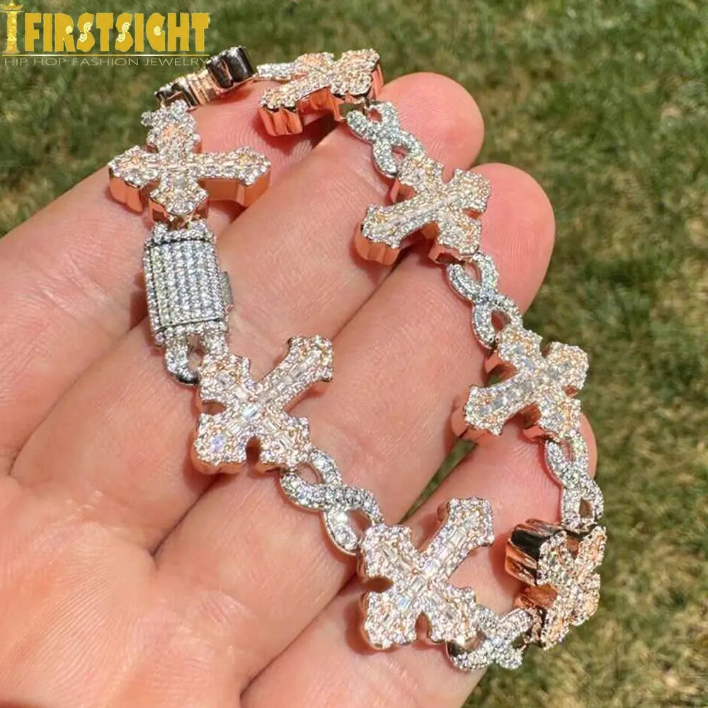Dazzle in the Spotlight Cross Charm Bracelet with cubic zirconia on a Cuban chain.