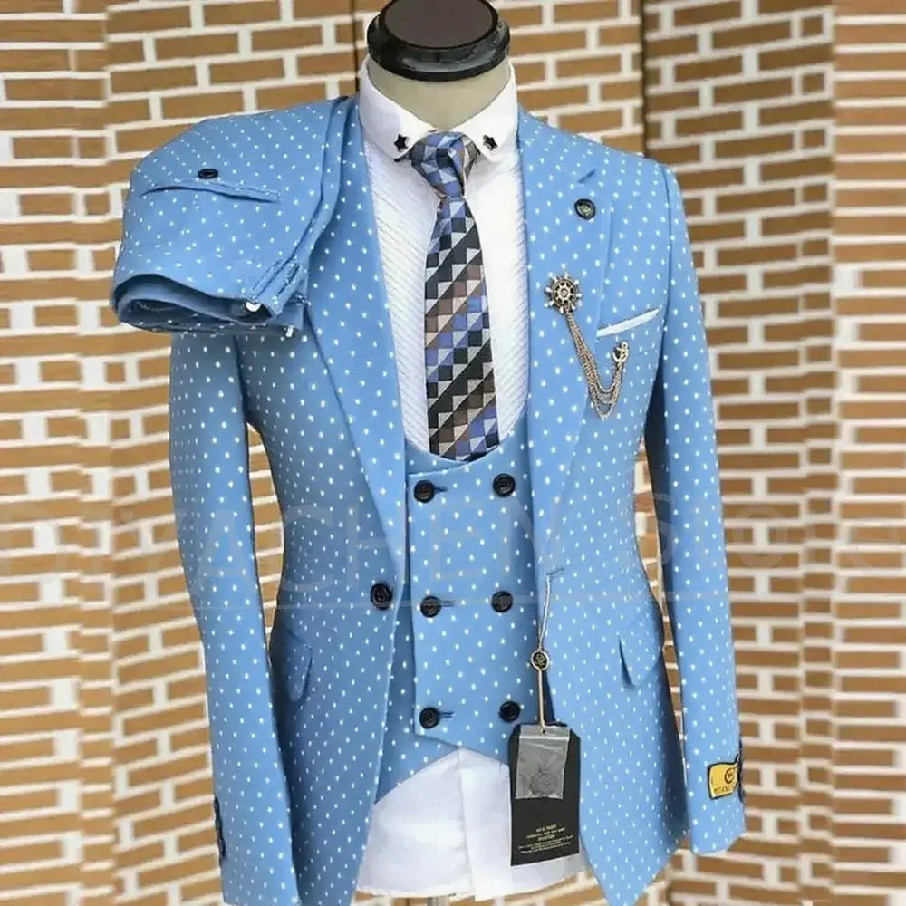 Navy blue three-piece suit styled with a crisp white shirt and tie.
