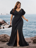 Detail shot of the mermaid silhouette of the Midnight Cascade dress, celebrating curves with sophistication.