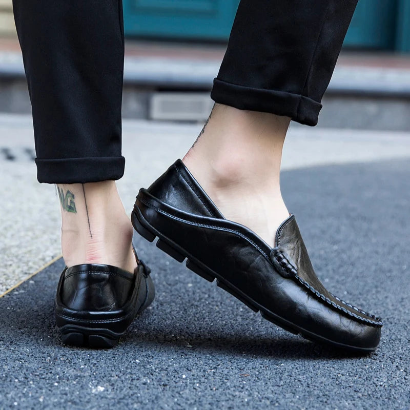 Side view of handcrafted leather loafers highlighting quality craftsmanship and modern elegance.