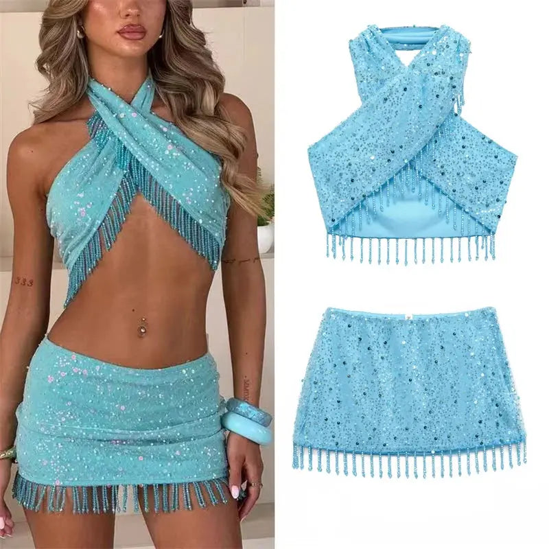 Elegant pearl fringe halter top in shimmering white, perfect for rooftop parties.