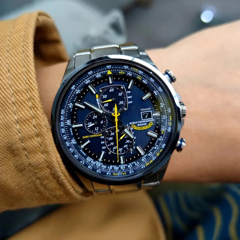 Close-up of stainless steel wristwatch with minimalist numberless dial.