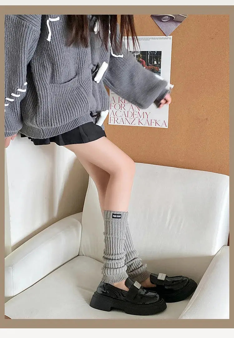 Durable gray knit socks, providing warmth without bulk.