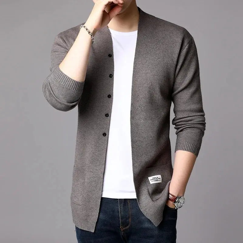 Close-up of the soft, breathable fabric blend of the Autumn Whisper cardigan, showcasing its flexibility and comfort.
