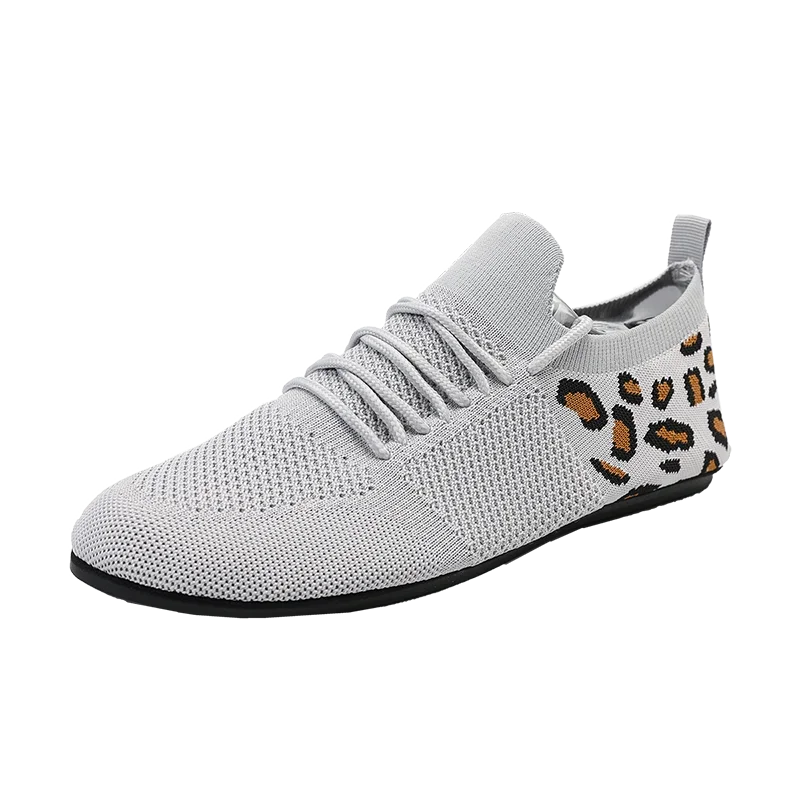 Whisper-Soft Steps sneakers paired with casual attire, demonstrating versatility as fashionable city shoes.