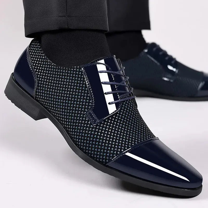 Close-up of black Oxford shoes showcasing the lace-up closure.
