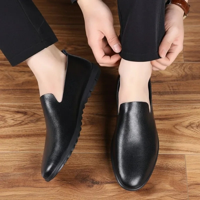 Men's loafers showcasing flexible design, ideal for tailored trousers.