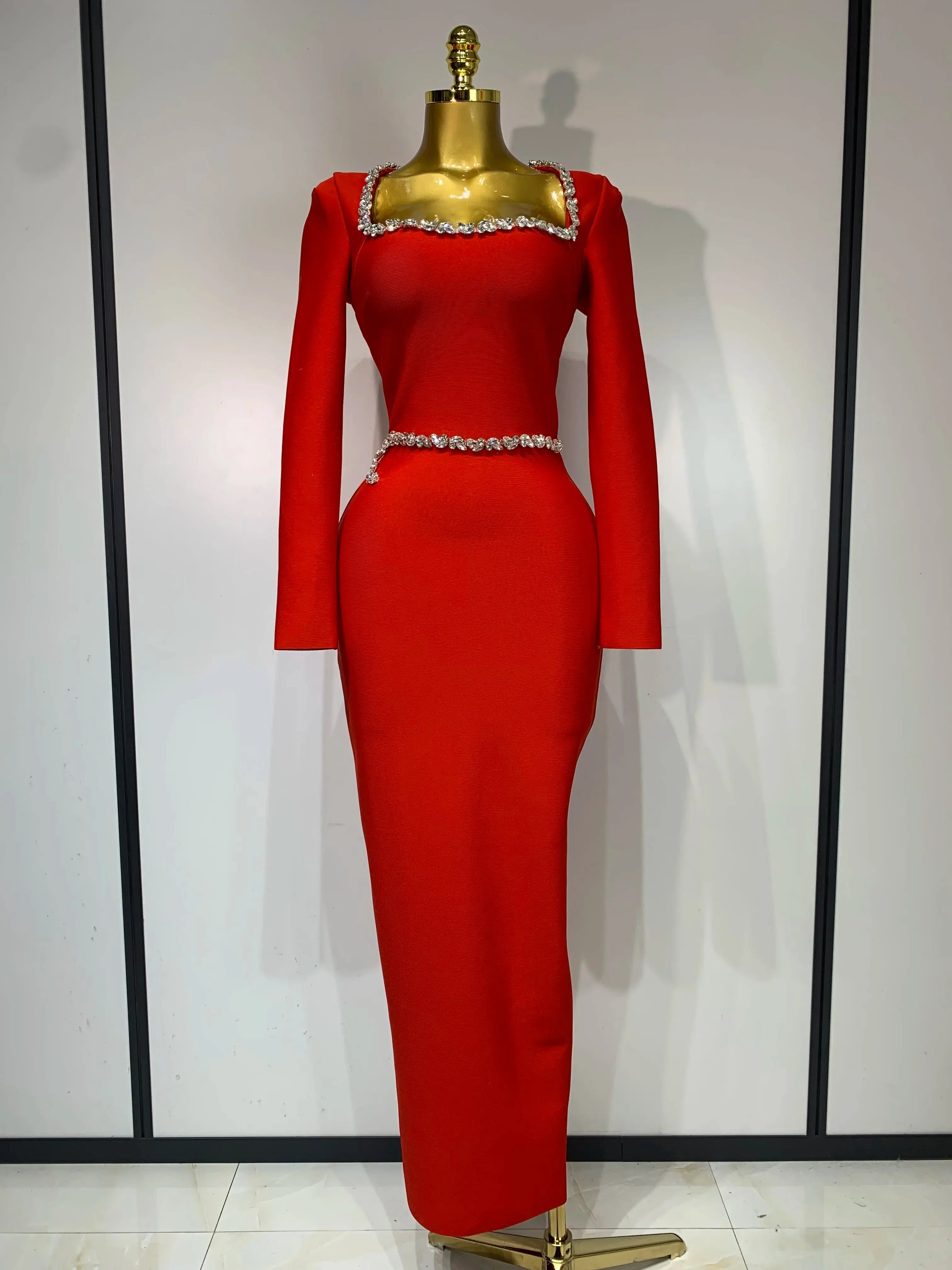 Radiant red sheath dress with intricate beading and a slim silhouette for a polished look.