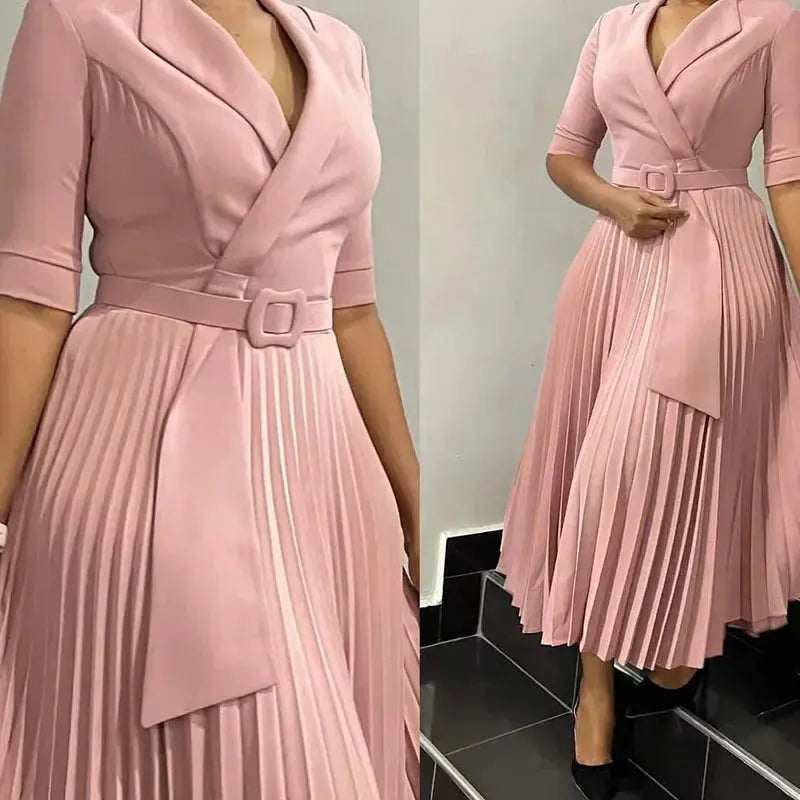 Close-up of the high-waist belt on the Command the Room dress, showcasing its structured design.