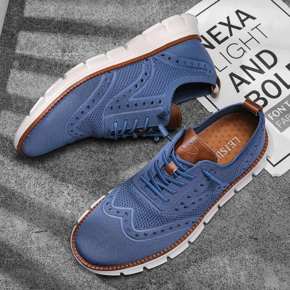 Side view of slip-on brogue sneakers featuring traditional wingtip design and modern mesh construction