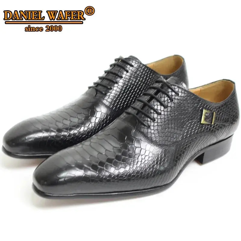 Lace-up closure of black pointed toe oxfords for a secure fit.