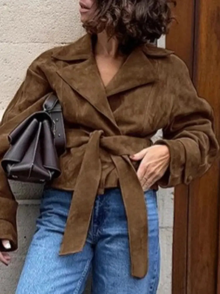 Model wearing the French suede jacket, styled for a professional office look with effortless elegance.