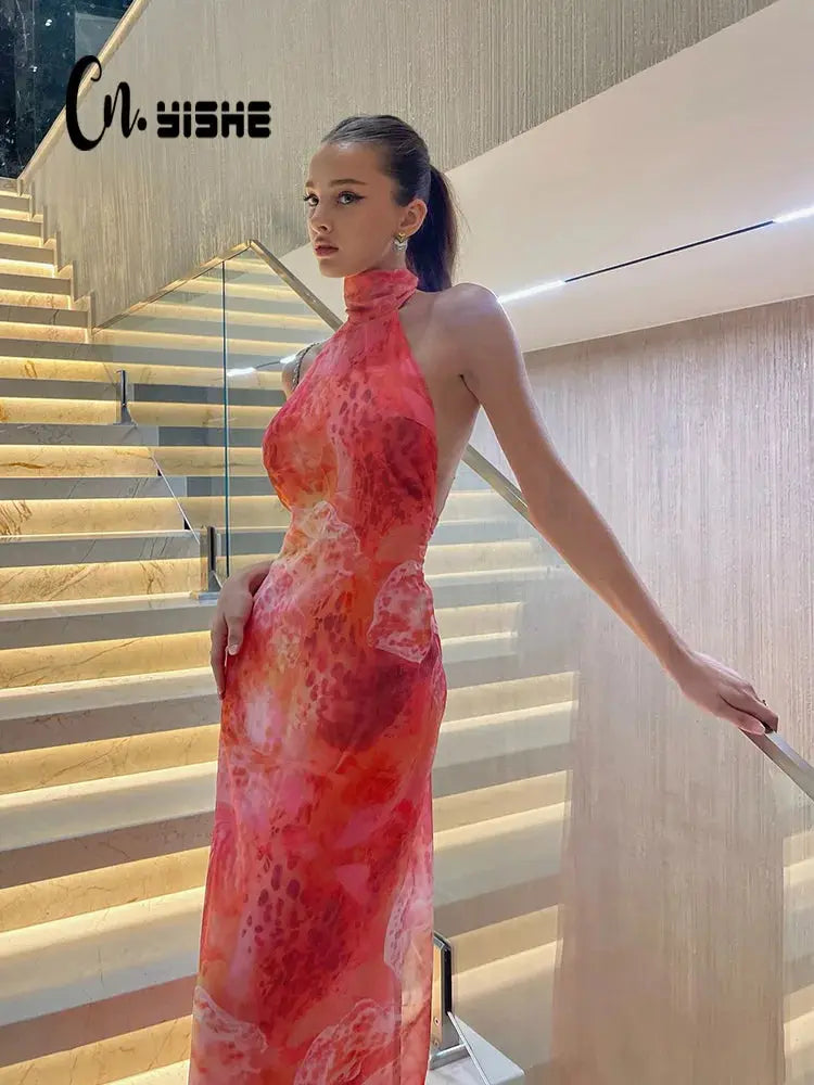 Twilight Whispers printed halter bodycon dress with sheer mesh overlay and backless design