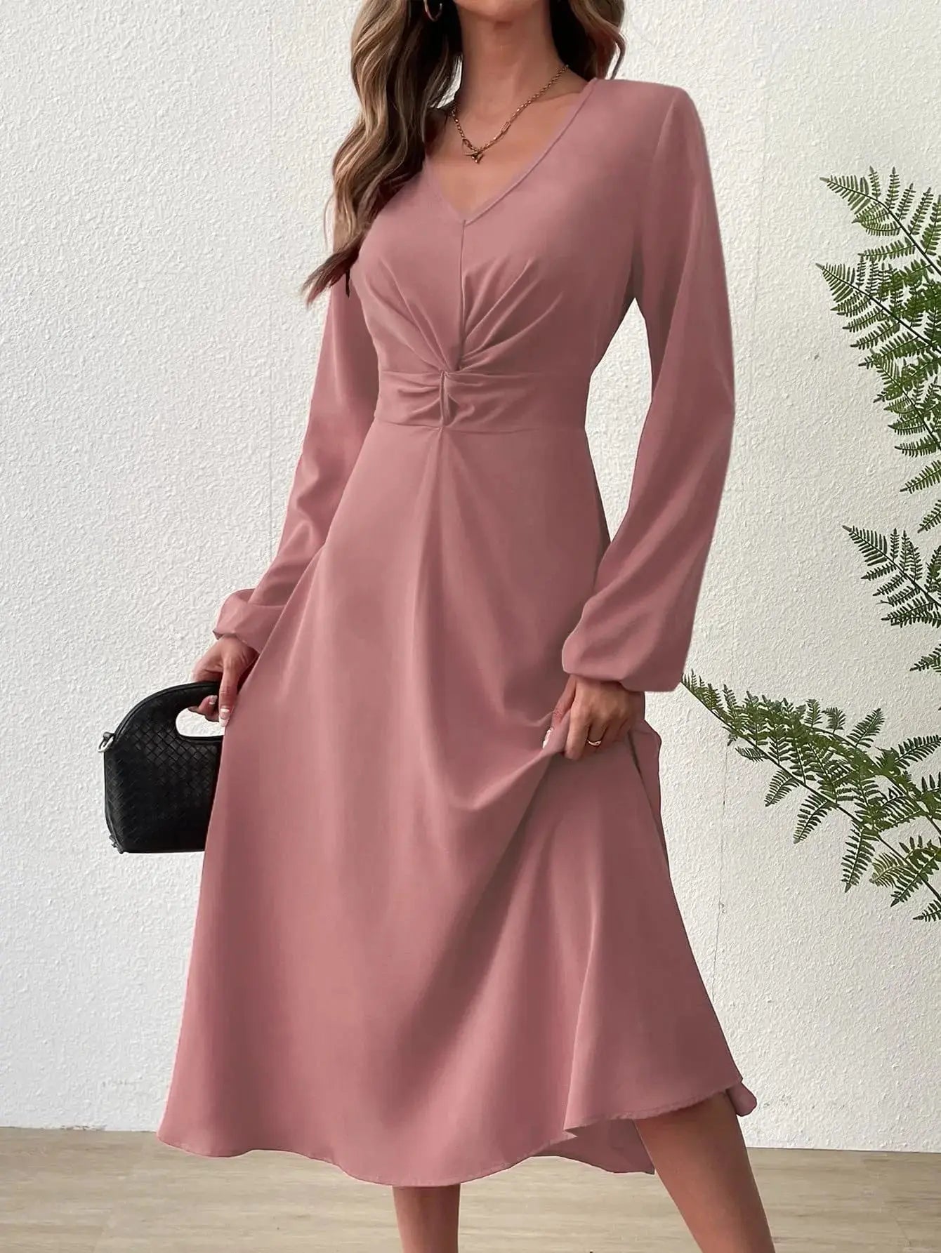 Midnight Allure dress in elegant black, ideal for formal wear and gala events.
