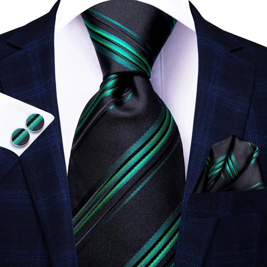 Silk tie set on a wooden surface, highlighting its luxurious design.
