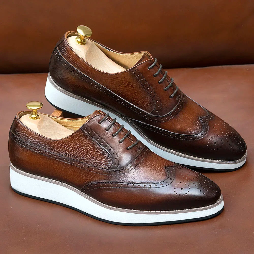 Men's black leather Oxford shoes with traditional wing tip design and lace-up closure