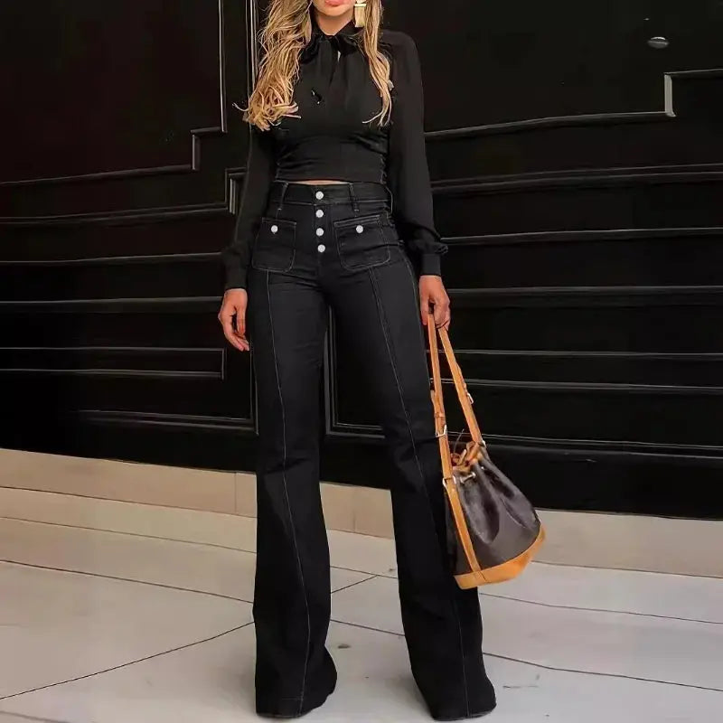 High-waist wide-leg jeans in dark blue, made from a breathable polyester blend.