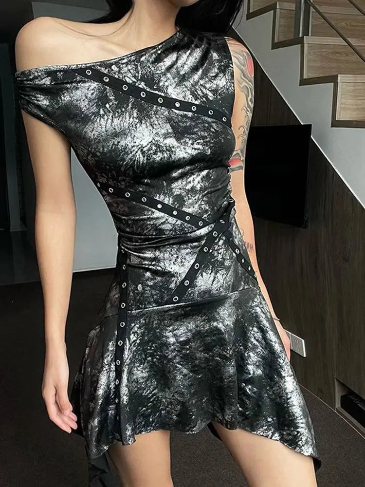 Close-up of the one-shoulder design showcasing the shimmering polyester material.