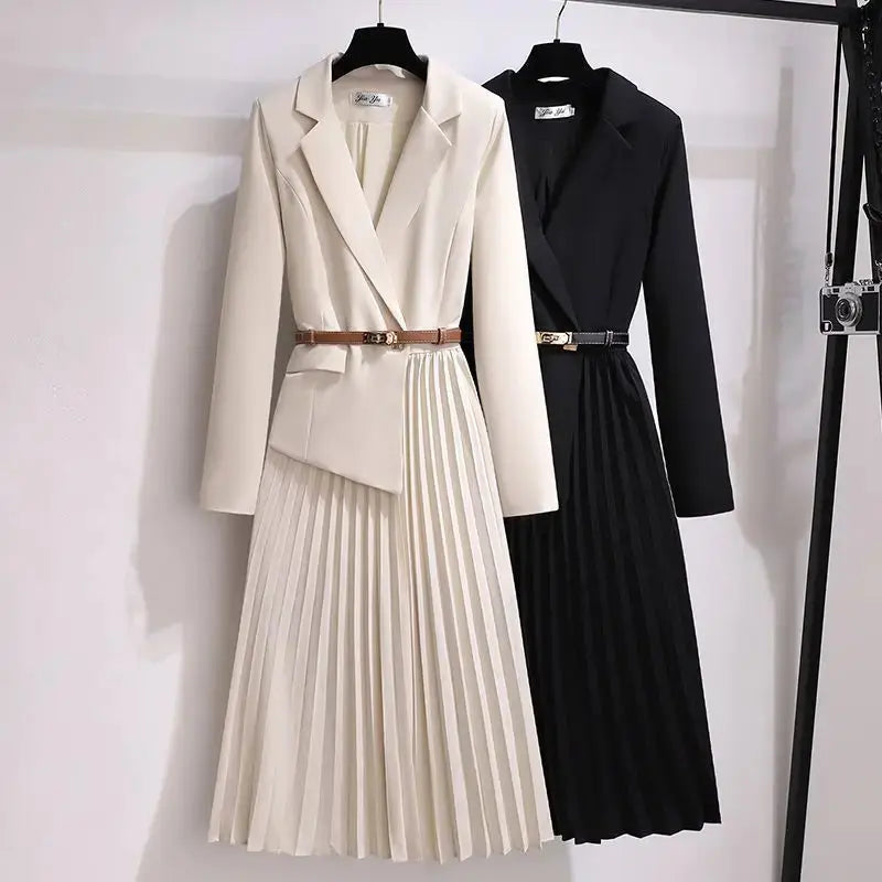 Chic French suit dress in navy with tailored V-neck and suit collar, perfect for professional settings.