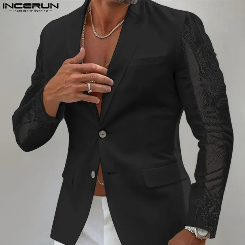 Close-up of the sophisticated lace detailing on a lightweight black blazer.