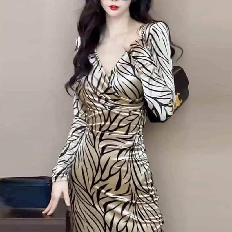 V-neck champagne leopard midi dress showing flattering silhouette and comfortable fit