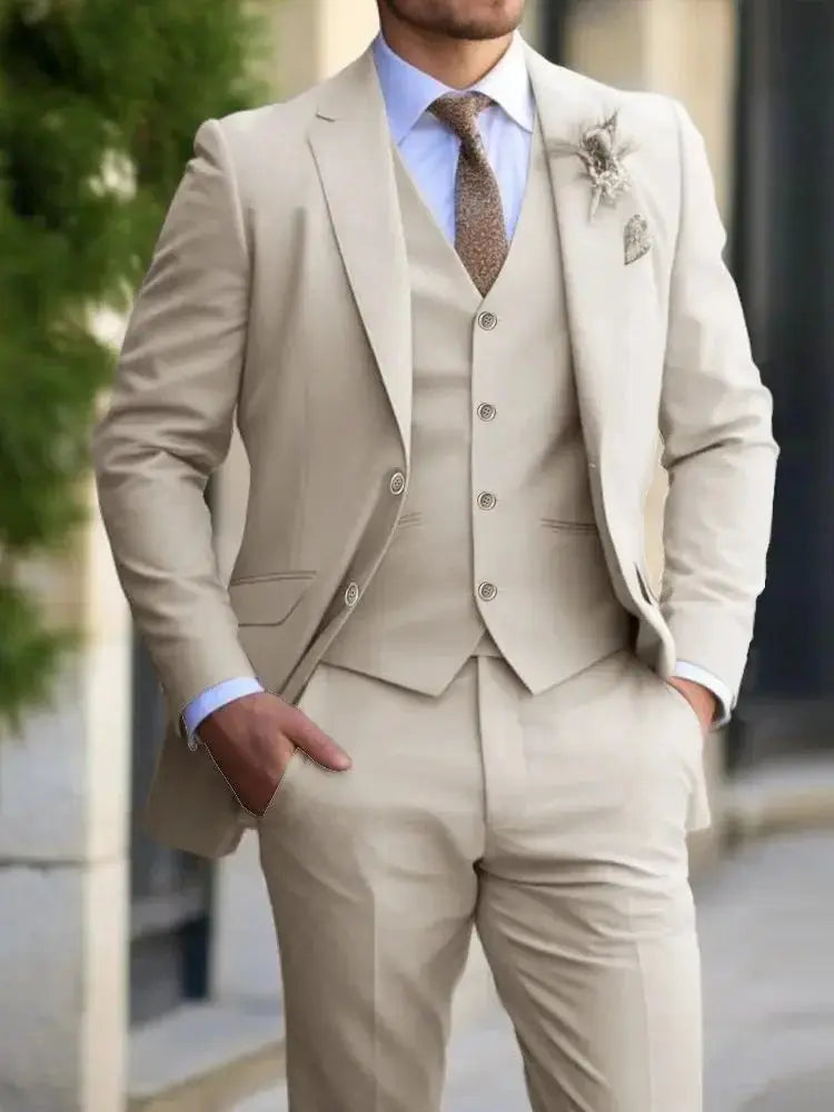 Model wearing a fitted black and grey suit set, perfect for weddings and professional events.