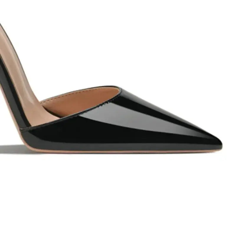Handmade craftsmanship detail on luxurious ankle strap heels.