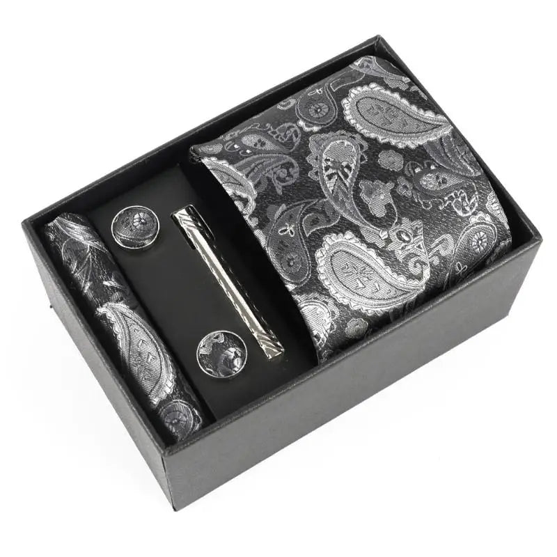 Intricate jacquard pattern on the silk tie, showcasing craftsmanship.