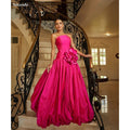 Enchanting Bloom Mermaid Gown in soft tulle with 3D floral embellishments and strapless design.