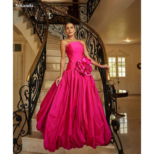 Enchanting Bloom Mermaid Gown in soft tulle with 3D floral embellishments and strapless design.
