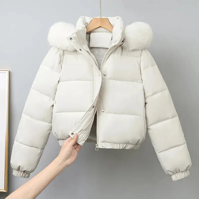 Chic outerwear featuring a comfortable fit and stylish hood.