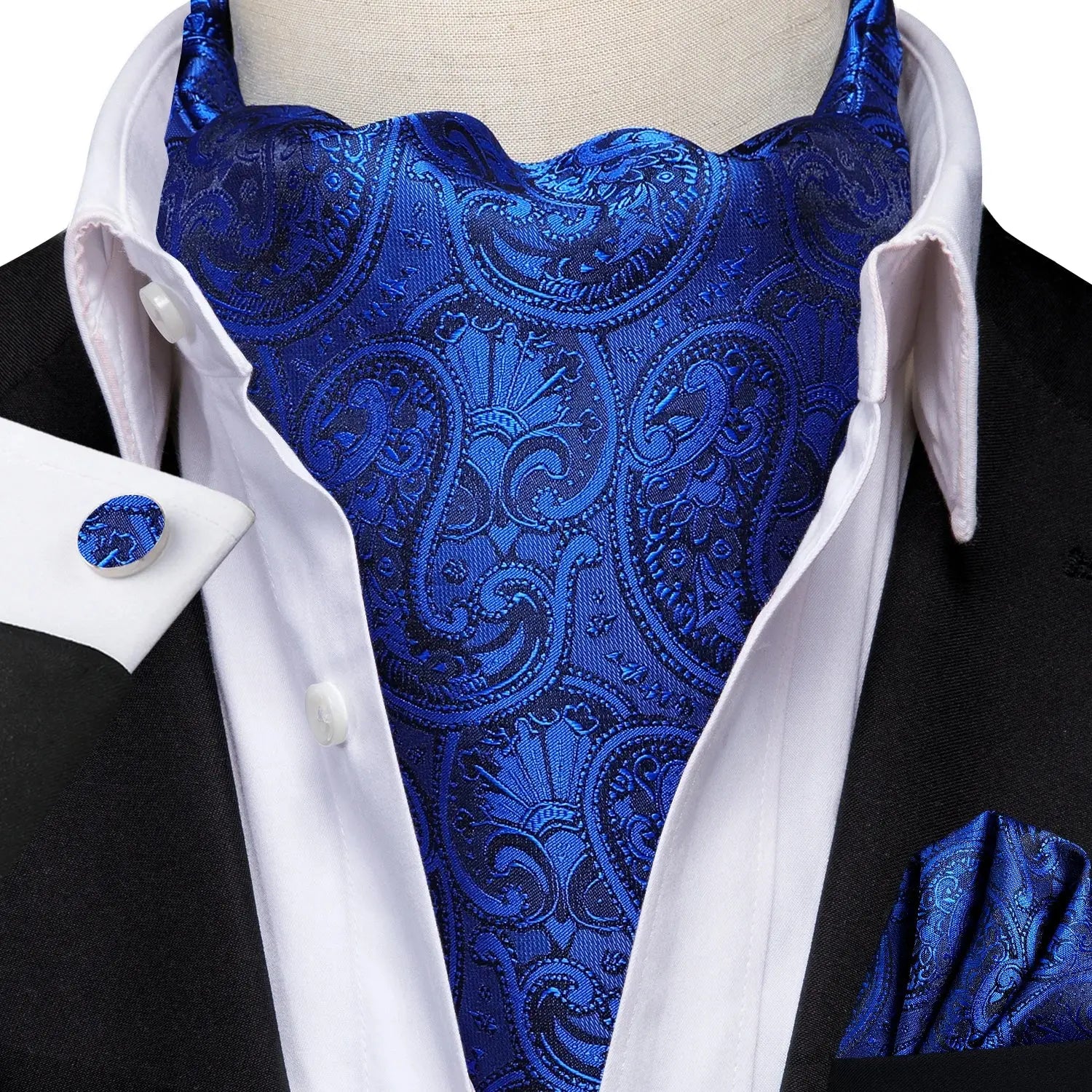 Dapper ascot with matching pocket square, ideal for weddings.